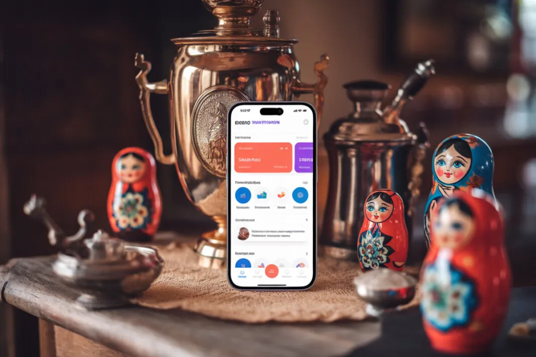Écran de smartphone montrant l'application Max entouré de symboles russes