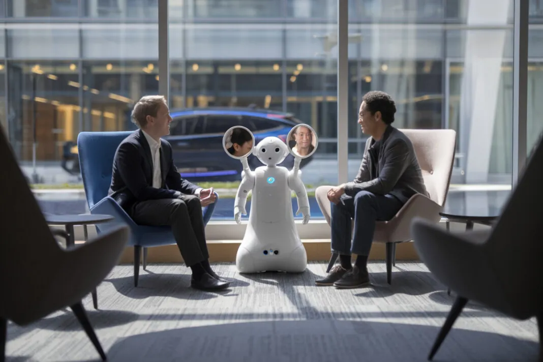 Deux inconnus se regardent via un robot-miroir dans un hall moderne